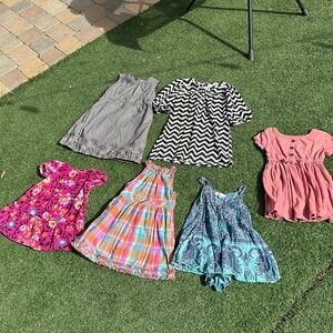 Little girl bundle of dresses and romper sizes 12-18mo and 4T-6T.